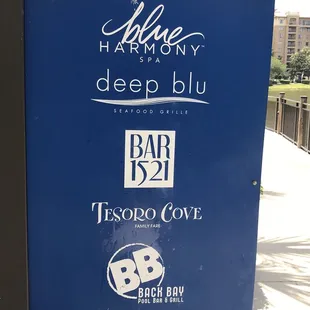 a blue sign for a hotel