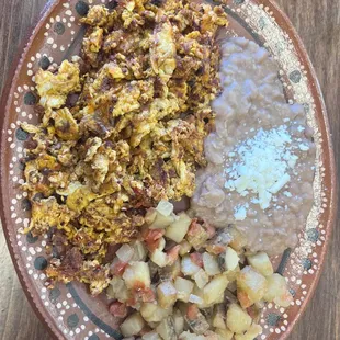 Huevos con chorizo, papas and beans