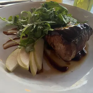 Pork tenderloin with green apple, arugula, and a polenta blue cheese cake