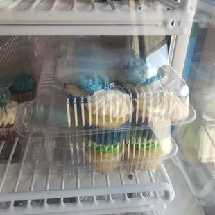a display of cupcakes