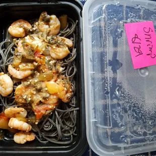 Today's regular meal: shrimp and tomatillos over black bean pasta $8