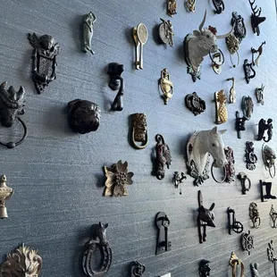 a wall full of metal objects