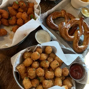 Buffalo cauliflower (amazing), garlic tots, &amp; warm pretzel! SO GOOD