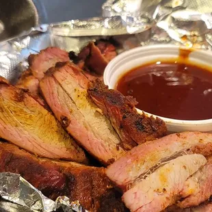 a tray of meat and sauce