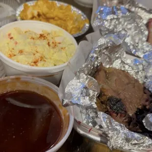 Brisket, potato salad, and baked Mac and cheese