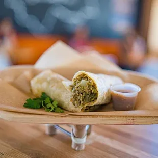 a burrito in a basket