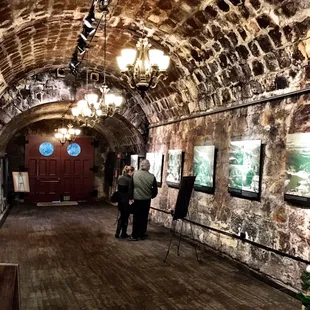 Main entrance cave with historic and informative pictures