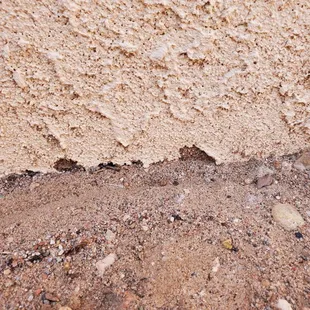 Contract says they will "trench where soil meets foundation approximately 4"-6"". They didn't even stucco to the soil.