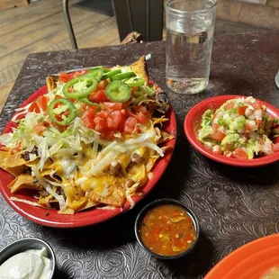 Nachos and guacamole. A delicious mound of vittles.