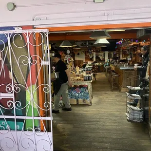 a woman walking through the door