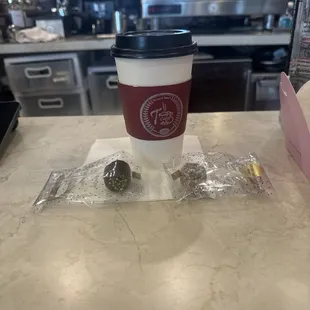 Fresh coffee with a side of chocolate