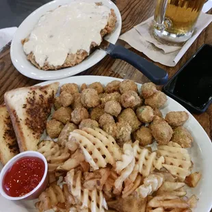 Chicken fried steak as big as the plate, good flavor and fried okra and waffles fries..all was yummie