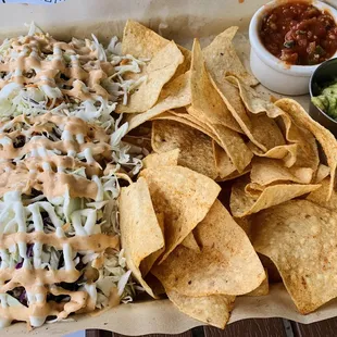 Three Brisket Tacos loaded with Slaw.