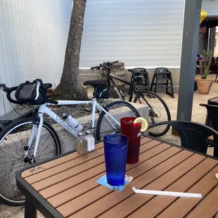 They kindly let us park bikes inside so we could watch them