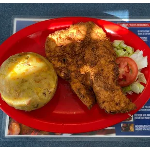 Mofongo with Breaded Chicken Breast and small salad. The portion was enough for a person.