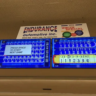 two large television screens