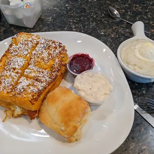 Monte Cristo Sandwich with a side of grits. I added on a side of biscuit and gravy.