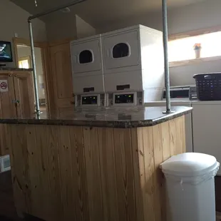 Very clean laundry room plus bath house.