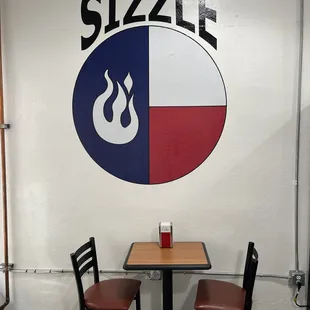 a table and two chairs