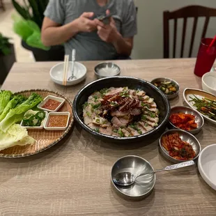 Jok Bal Half and Half combo with assortment of kimchi