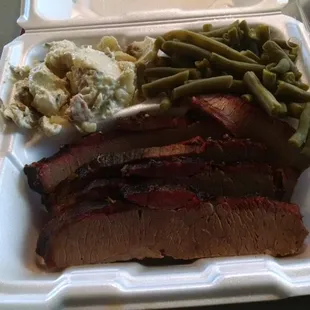 One meat plate with 2 sides. Brisket, green beans, and potato cassarole.