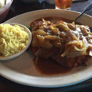 Chicken Fried Chicken with Brown gravy and onions