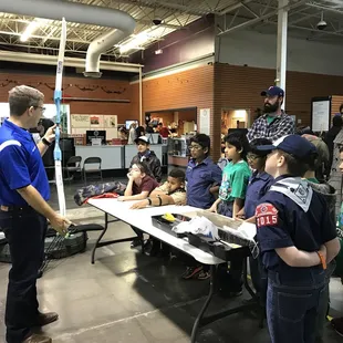 Cub Scout Bears and Webelos learning about different bows.