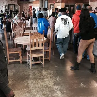 a group of people in a restaurant