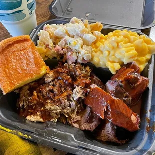 Two meat plate with Beef Brisket, Pulled Pork, Mac &amp; Cheese, Barrel Baked Potatoes, &amp; Cornbread.