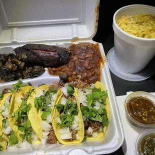 Brisket tacos, chicken spaghetti, sautéed mushrooms,pork rib and baked beans. All wonderful!