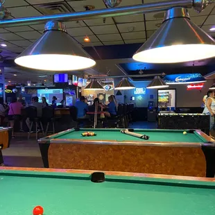 View of the bar area and billiards tables