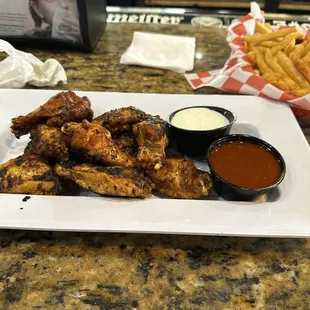 Blackened Award Winning Wings, with Explosive sauce on the side.