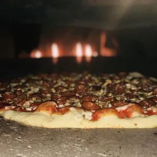 Texas Holy Cow!  Pepperoni, Beef, Garlic, Fresh Mushrooms, mozzarella &amp; fresh grate Parmesan cheese.