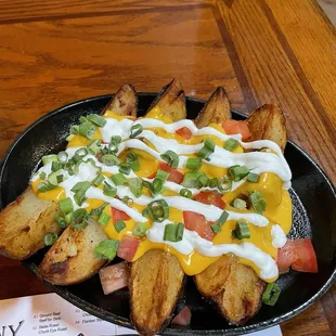 Potatoes with sour cream and cheese