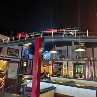 Mini Train on tracks that you can see, while eating in the restaurant.