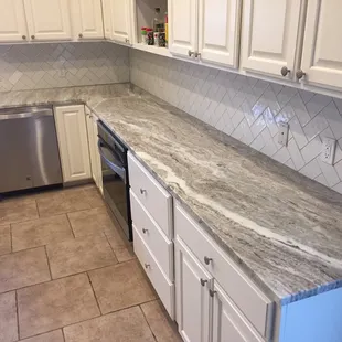 Installation of granite and new backsplash.