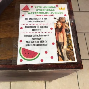 a watermelon juice advertisement on a table