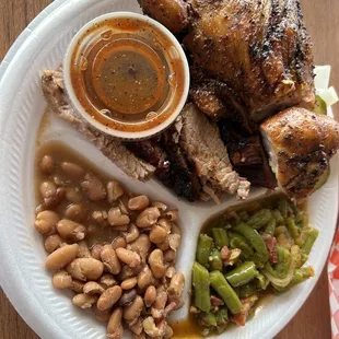 Two meat plate with brisket and chicken. Everything was so good. The sides were just as amazing!