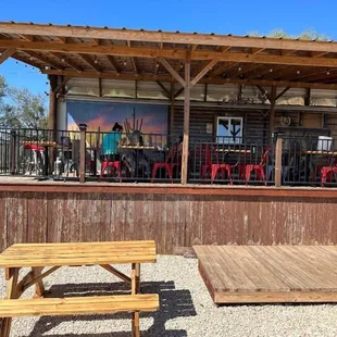 a picnic area with tables and benches