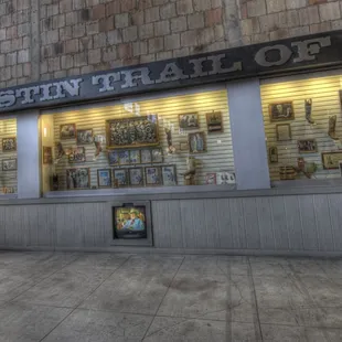 Tribute exhibit to John Justin, Jr. Items include original boots, letters from famous ordering boots, bronzes and more.