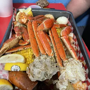 crab legs, corn, potatoes, corn on the cob, corn on the cob, corn on the co