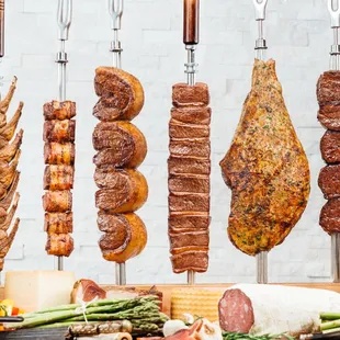All of our meats are cooked the gaucho way - over an open flame with natural wood charcoal.