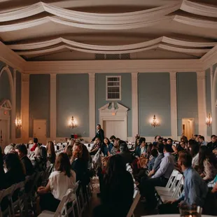 The ballroom had 220 chairs set up and 20 tables and still had room to spare!