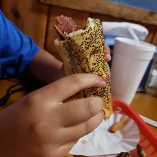 Kids hot dog. Surprised with the poppy seed bun