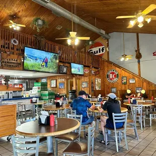 Sitting area. Walk in and additional seating (booths) to the right
