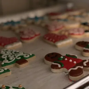 a tray of decorated cookies