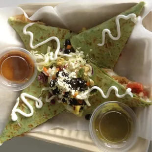 Garden spinach tortilla, cheese and chicken quesadilla.