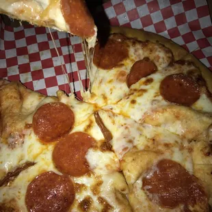 Hot, Cheesy, pepperoni pizza on point! Thursday.. buy one pizza, get one free!!