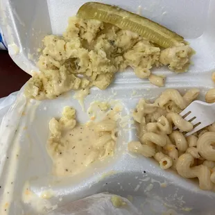 Pulled pork sammy, potato salad, Mac and cheese, and a pickle.