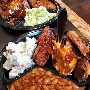 BBQ chicken, ribs, baked beans, coleslaw and potato salad